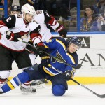 St. Louis Blues left wing Magnus Paajarvi battles for the puck against Arizona Coyotes right wing Brad Richardson in third period of an NHL hockey game Tuesday, Dec. 8, 2015, in St. Louis. (Chris Lee/St. Louis Post-Dispatch via AP)  EDWARDSVILLE INTELLIGENCER OUT; THE ALTON TELEGRAPH OUT; MANDATORY CREDIT