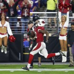 Arizona Cardinals wide receiver John Brown (12) runs for a touchdown after the catch against the Minnesota Vikings during the first half of an NFL football game, Thursday, Dec. 10, 2015, in Glendale, Ariz. (AP Photo/Rick Scuteri)