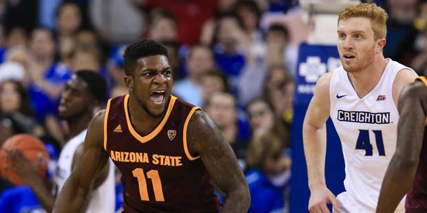 Arizona State's Savon Goodman (11) reacts after scoring against Creighton's Cole Huff, left, with G...