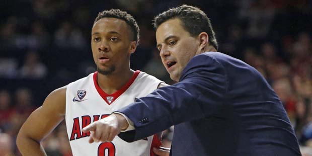Arizona head coach Sean Miller talks to Parker Jackson-Cartwright (0) during the second half of an ...