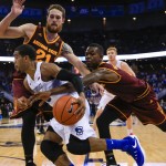 Creighton's Maurice Watson Jr. (10) drives around Arizona State's Eric Jacobsen (21) and Gerry Blakes, right, during the second half of an NCAA college basketball game in Omaha, Neb., Wednesday, Dec. 2, 2015. Arizona State won 79-77. (AP Photo/Nati Harnik)