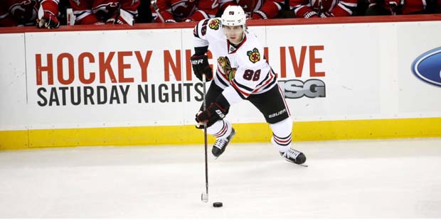 Chicago Blackhawks right wing Patrick Kane skates with the puck against the New Jersey Devils durin...