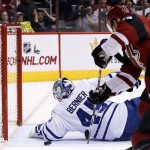 Arizona Coyotes' Shane Doan, right, beats Toronto Maple Leafs' Jonathan Bernier, left, for his second goal in the first period of an NHL hockey game Tuesday, Dec. 22, 2015, in Glendale, Ariz. (AP Photo/Ross D. Franklin)