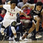 Grand Canyon guard Dominic Magee, right, dribbles as San Diego State guard Jeremy Hemsley defends during the first half of an NCAA college basketball game Friday, Dec. 18, 2015, in San Diego. (AP Photo/Gregory Bull)