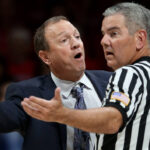 Long Beach State coach Dan Monson tries to sway game official Bill Vinovich on a call against his team during the second half against Arizona in an NCAA college basketball game Tuesday, Dec. 22, 2015, in Tucson, Ariz. (Kelly Presnell/Arizona Daily Star via AP)