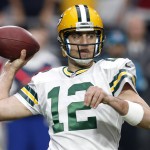 Green Bay Packers quarterback Aaron Rodgers (12) throws against the Arizona Cardinals during the first half of an NFL football game, Sunday, Dec. 27, 2015, in Glendale, Ariz. (AP Photo/Ross D. Franklin)
