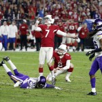 Arizona Cardinals kicker Chandler Catanzaro (7) watches his field goal split the uprights as Drew Butler (2) holds and Minnesota Vikings cornerback Marcus Sherels (35) tries to block during the second half of an NFL football game, Thursday, Dec. 10, 2015, in Glendale, Ariz. (AP Photo/Ross D. Franklin)