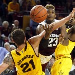 Texas A&M guard Danuel House (23) is called for the offensive foul on Arizona State forward Eric Jacobsen (21) during the first half of an NCAA college basketball game, Saturday, Dec. 5, 2015, in Tempe, Ariz. (AP Photo/Rick Scuteri)
