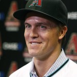 Arizona Diamondbacks pitcher Zack Greinke talks to the media during a press conference, Friday, Dec. 11, 2015, in Phoenix. Greinke could have stayed with the Los Angeles Dodgers or gone up the coast to the San Francisco Giants. Instead, he signed a massive contract with the Arizona Diamondbacks, dramatically shifting the landscape in the NL West.  (AP Photo/Rick Scuteri)