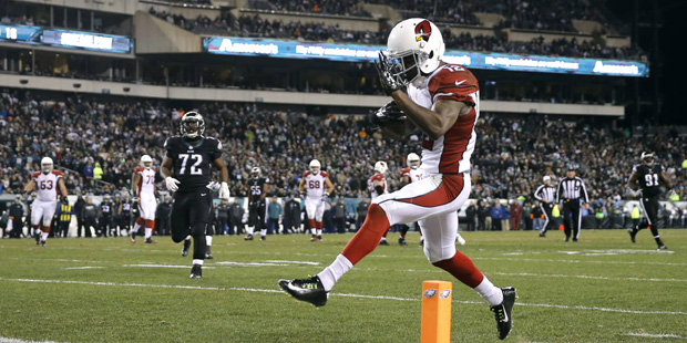 Arizona Cardinals' John Brown scores a touchdown during the second half of an NFL football game aga...