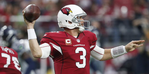 Arizona Cardinals quarterback Carson Palmer (3) throws against the Seattle Seahawks during the firs...