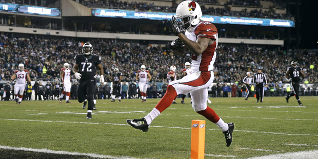 Arizona Cardinals' John Brown scores a touchdown during the second half of an NFL football game aga...