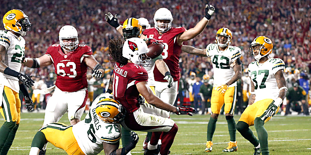 Arizona Cardinals wide receiver Larry Fitzgerald (11) scores the game-winning touchdown against the...