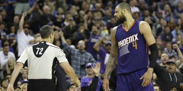 Phoenix Suns center Tyson Chandler, right, has words for official J.T. Orr, after Orr ejected him d...