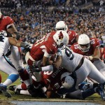 Arizona Cardinals' David Johnson runs for a touchdown during the first half the NFL football NFC Championship game against the Carolina Panthers, Sunday, Jan. 24, 2016, in Charlotte, N.C. (AP Photo/Mike McCarn)