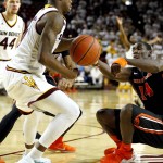 Oregon State's Daniel Gomis (14) loses the ball to Arizona State's Gerry Blakes during the first half of an NCAA college basketball game, Thursday, Jan. 28, 2016, in Tempe, Ariz. (AP Photo/Matt York)