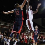 Stanford guard Marcus Allen (15) goes up for a shot as Arizona forward Ryan Anderson (12) defends during the second half of an NCAA college basketball game Thursday, Jan. 21, 2016, in Stanford, Calif. Arizona won 71-57. (AP Photo/Marcio Jose Sanchez)