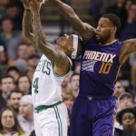 Boston Celtics guard Isaiah Thomas (4) shoots past the attempted block by Phoenix Suns guard Sonny Weems (10) during the second half of an NBA basketball game Friday, Jan. 15, 2016, in Boston. The Celtics defeated the Suns 117-103. (AP Photo/Stephan Savoia)