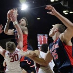 Arizona guard Gabe York (1) drives to the basket over Stanford center Grant Verhoeven (30) during the first half of an NCAA college basketball game Thursday, Jan. 21, 2016, in Stanford, Calif. (AP Photo/Marcio Jose Sanchez)
