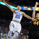 UCLA's Bryce Alford (20) goes for a layup against Arizona State's Kodi Justice in the second half of an NCAA college basketball game in Los Angeles, Saturday, Jan. 9, 2016. UCLA won 81-74. (AP Photo/Michael Owen Baker)