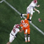 Alabama quarterback Jake Coker throws during the first half of the NCAA college football playoff championship game against Clemson Monday, Jan. 11, 2016, in Glendale, Ariz. (AP Photo/Ross D. Franklin)