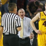 Arizona State head coach Bobby Hurley, center, reacts toward an official after being called for a technical foul as Arizona State's Savon Goodman (11) and Kodi Justice watch during the second half of an NCAA college basketball game against Arizona, Sunday, Jan. 3, 2016, in Tempe, Ariz. Arizona defeated Arizona State 94-82. (AP Photo/Ralph Freso)
