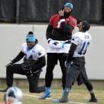 Carolina Panthers' Cam Newton (1) and Corey Brown (10) share a laugh at the start of practice  in Charlotte, N.C., as the team prepares for the NFC Championship game against the Arizona Cardinals, Wednesday, Jan. 20, 2016. (David Foster IIICharlotte Observer via AP)