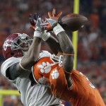 Alabama's Marlon Humphrey, left, breaks up a pass intended for Clemson's Artavis Scott during the second half of the NCAA college football playoff championship game Monday, Jan. 11, 2016, in Glendale, Ariz. (AP Photo/Chris Carlson)