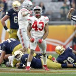 Ohio State linebacker Darron Lee (43) celebrates his sack against Notre Dame during the second half of the Fiesta Bowl NCAA College football game, Friday, Jan. 1, 2016, in Glendale, Ariz. Ohio State won 44-28. (AP Photo/Ross D. Franklin)