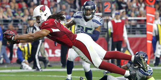 Arizona Cardinals wide receiver Larry Fitzgerald (11) scores a touchdown against the Seattle Seahaw...