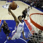 Philadelphia 76ers' Ish Smith goes up for a dunk during the first half of an NBA basketball game against the Phoenix Suns, Tuesday, Jan. 26, 2016, in Philadelphia. (AP Photo/Matt Slocum)