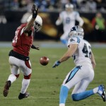 Arizona Cardinals' Patrick Peterson can't handle a punt during the first half the NFL football NFC Championship game against the Carolina Panthers, Sunday, Jan. 24, 2016, in Charlotte, N.C. The Panthers recovered. (AP Photo/David J. Phillip)
