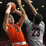 Oregon State forward Tres Tinkle (3) shoots in front of Arizona forward Mark Tollefsen during the first half of an NCAA college basketball game, Saturday, Jan. 30, 2016, in Tucson, Ariz. (AP Photo/Rick Scuteri)