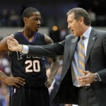 Phoenix Suns' Archie Goodwin (20) takes instruction from head coach Jeff Hornacek during the first half of an NBA basketball game against the Dallas Mavericks, Sunday, Jan. 31, 2016, in Dallas. (AP Photo/Tony Gutierrez)