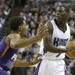 Phoenix Suns guard Ronnie Price, left, defends as Sacramento Kings guard Darren Collison moves the ball during the first half of an NBA basketball game Saturday, Jan. 2, 2016, in Sacramento, Calif.(AP Photo/Rich Pedroncelli)