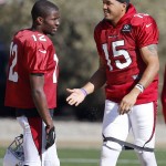Arizona Cardinals' Michael Floyd (15) talks with John Brown (12) during NFL football practice at Cardinals training facility Wednesday, Jan. 20, 2016, in Tempe, Ariz.  The Cardinals will face the Carolina Panthers in the NFC Championship game on Sunday in Charlotte. (AP Photo/Ross D. Franklin)