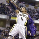Phoenix Suns guard Archie Goodwin (20) comes from behind to block the shot over Indiana Pacers guard Monta Ellis (11) during the first half of an NBA basketball game in Indianapolis, Tuesday, Jan. 12, 2016. (AP Photo/Michael Conroy)