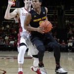 Arizona State guard Tra Holder, right, dribbles past Stanford guard Christian Sanders during the first half of an NCAA college basketball game Saturday, Jan. 23, 2016, in Stanford, Calif. (AP Photo/Marcio Jose Sanchez)