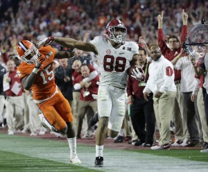 Clemson's T.J. Green (15) knocks Alabama's O.J. Howard out of bounds after a catch during the second half of the NCAA college football playoff championship game Monday, Jan. 11, 2016, in Glendale, Ariz. (AP Photo/David J. Phillip)