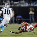 Carolina Panthers' Corey Brown gets past Arizona Cardinals' Rashad Johnson for a touchdown catch during the first half the NFL football NFC Championship game Sunday, Jan. 24, 2016, in Charlotte, N.C. (AP Photo/David J. Phillip)