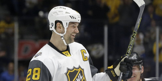 Pacific Division forward John Scott (28) skates to the bench after scoring a goal against the Centr...