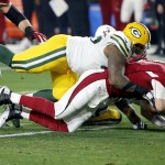 Green Bay Packers defensive end Mike Daniels (76) sacks Arizona Cardinals quarterback Carson Palmer (3) during the first half of an NFL divisional playoff football game, Saturday, Jan. 16, 2016, in Glendale, Ariz. (AP Photo/Ross D. Franklin)