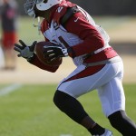 Arizona Cardinals' Patrick Peterson returns a punt during NFL football practice at Cardinals training facility Wednesday, Jan. 20, 2016, in Tempe, Ariz.  The Cardinals will face the Carolina Panthers in the NFC Championship game on Sunday in Charlotte. (AP Photo/Ross D. Franklin)