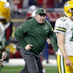 Green Bay Packers head coach Mike McCarthy takes the field prior to an NFL divisional playoff football game against the Arizona Cardinals, Saturday, Jan. 16, 2016, in Glendale, Ariz. (AP Photo/Ross D. Franklin)