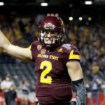 Arizona State quarterback Mike Bercovici celebrates a touchdown pass against West Virginia during the first half of the Cactus Bowl NCAA college football game, Saturday, Jan. 2, 2016, in Phoenix. (AP Photo/Ross D. Franklin)