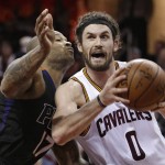 Cleveland Cavaliers' Kevin Love, right, drives past Phoenix Suns' P.J. Tucker during the second half of an NBA basketball game Wednesday, Jan. 27, 2016, in Cleveland. The Cavaliers won 115-93. (AP Photo/Tony Dejak)