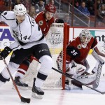 Los Angeles Kings' Vincent Lecavalier (44) moves with the puck as Arizona Coyotes' Oliver Ekman-Larsson (23), of Sweden, defends as Coyotes goalie Louis Domingue (35) and Kings' Marian Gaborik (12), of the Czech Republic, watch during the first period of an NHL hockey game Saturday, Jan. 23, 2016, in Glendale, Ariz. (AP Photo/Ross D. Franklin)