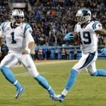 Carolina Panthers' Ted Ginn runs for a touchdown as teammate Cam Newton runs with him during the first half the NFL football NFC Championship game against the Arizona Cardinals, Sunday, Jan. 24, 2016, in Charlotte, N.C. (AP Photo/Mike McCarn)