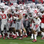 Ohio State players take the field before the Fiesta Bowl NCAA College football game against Notre Dame, Friday, Jan. 1, 2016, in Glendale, Ariz.  (AP Photo/Ross D. Franklin)