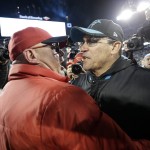 Carolina Panthers head coach Ron Rivera is congratulated by Arizona Cardinals head coach Bruce Arians after the NFL football NFC Championship game Sunday, Jan. 24, 2016, in Charlotte, N.C. The Panthers won 49-15 to advance to the Super Bowl. (AP Photo/David J. Phillip)